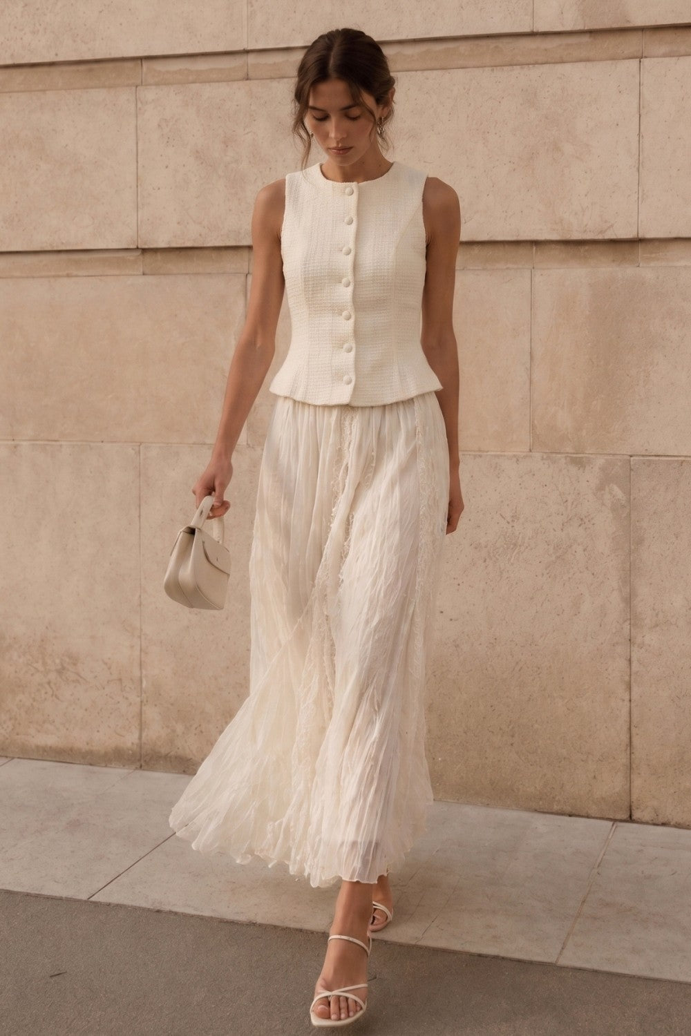 BUTTONED VEST WITH BACK TIE